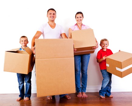 Man with Van Cobham delivering furniture to a new home