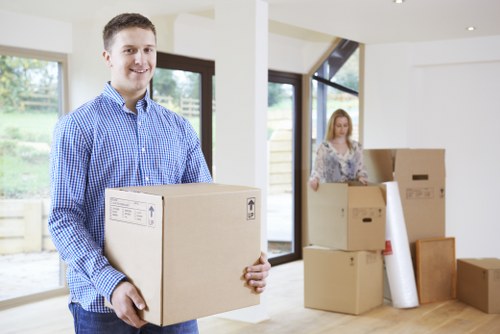Professional movers handling furniture