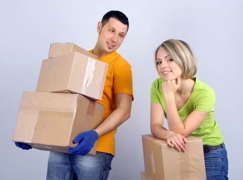 Man with Van Reigate team packing items for a move