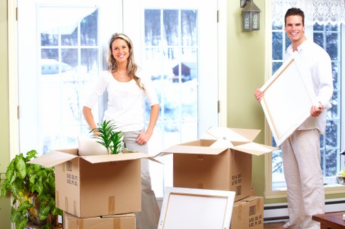 Professional movers assisting with a house relocation